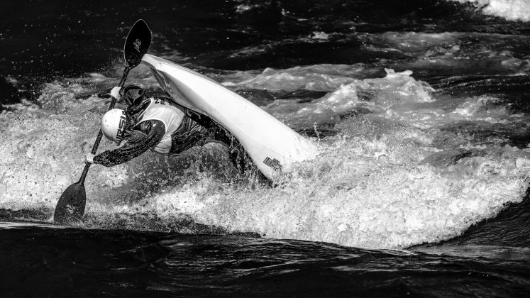 Alex Maggs seen paddling on the Kananaskis River, Alberta , Canada during the 2021 Canadian National Freestyle Team Trials Day 2.