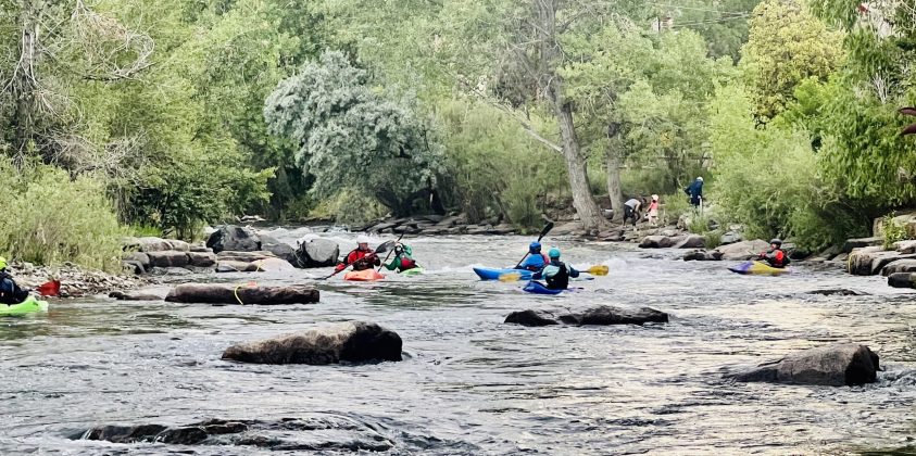 Kayakers on Clear Creek play part in Golden CO